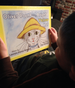 A Young Reader Enjoying Oliver Poons